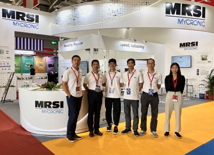 CIOE 2020 MRSI Mycronic booth with people